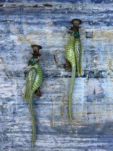 Pair of green porcelain wall sconces in the form of Parrots