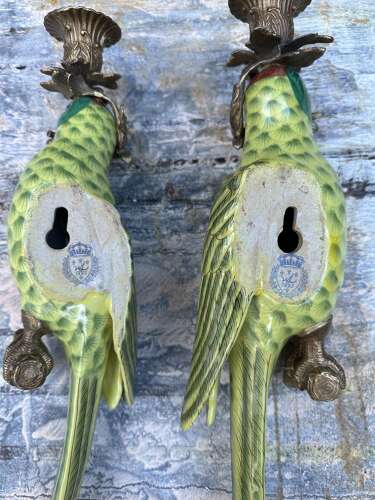 Pair of green porcelain wall sconces in the form of Parrots
