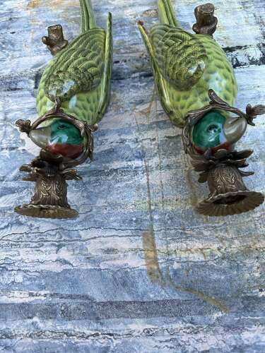 Pair of green porcelain wall sconces in the form of Parrots